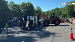 Rollover crash on Thruway in Yonkers involving garbage truck snarls traffic
