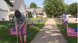 Boys Spread Patriotism With Neighborhood Flag Display