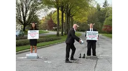Animal rights activists cemented their feet during protest outside PepsiCo headquarters over alleged cruelty