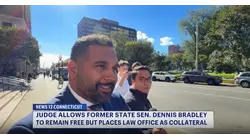 Former state senator will remain free on bond despite re-arrest on ballot charges