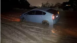 Car gets stuck in the mud on Mulholland Drive in Woodland Hills