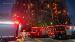 Smoke billows from building amid fire in Hong Kong high rise