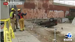 Suspect crashes into innocent driver at end of chase in downtown LA intersection