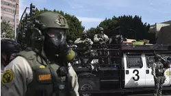 Trump administration sues California over law banning masked federal agents