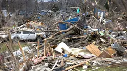 Millions Clean Up After Deadly Storms and Brace for New Round