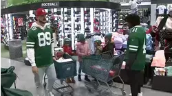 Jets players throw holiday shopping spree for kids at Dick's Sporting Goods in NJ