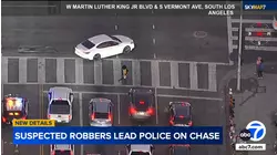 LA chase: Robbery suspects run red lights, avoid spike strips
