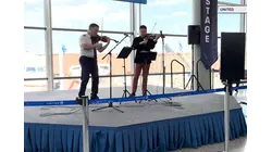 World-class violinists surprise travelers with performance at Newark Airport