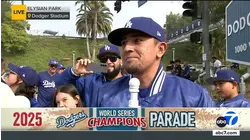 Fans stand outside Dodger Stadium to celebrate players