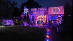 Knicks fan celebrates NBA win with blue and orange LED light display of Deer Park home