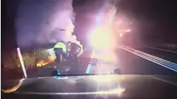 NJ police pull driver from car fire in harrowing rescue