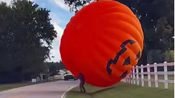 Watch: Giant Inflatable Pumpkin Rolls Down North Carolina Road