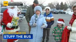 Stuffing The Bus for the Disney Ultimate Toy Drive