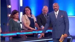 Steve Harvey gets way too excited and loses his card! | Family Feud