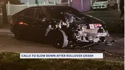 Car crashes and rolls over, striking parked vehicle in Bridgeport