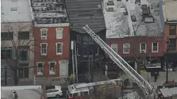 Crews respond to row home fire on Main Street in Manayunk