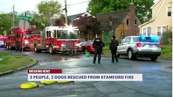 Crews battle house fire in Stamford