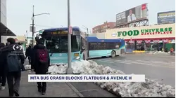 MTA bus crashes onto sidewalk, blocks intersection in Flatbush