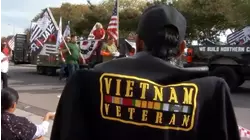 Flags fly through Downtown Fresno for Veterans' Day Parade