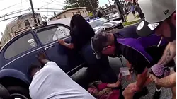 Bystanders Lift Car to Rescue Woman Trapped Underneath