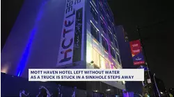 Mott Haven hotel without water as truck is left in sinkhole steps nearby