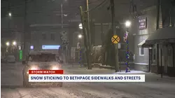 Massapequa Park residents run last-minute errands under evening snowfall