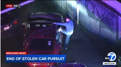 Orange County chase ends after authorities surround driver, passenger in suspected stolen car