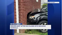 SUV crashes into Norwalk apartment building, displacing four residents