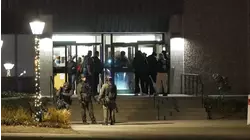 Search for Brown campus shooter continues as person of interest was released