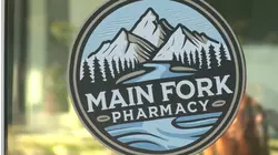 Main Fork Pharmacy in Three Rivers holds ribbon and grand opening