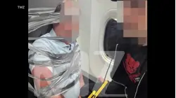 Passenger restrained on American  flight