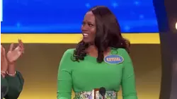 Steve Harvey escorts Ayah back to her podium!