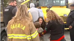 Durham school bus overturns with students onboard