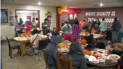 Hundreds line up for Thanksgiving meal at Poverello House