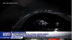 Two men rescued after nine days trapped under Nepal flood debris