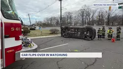 Car flips over at busy intersection in Watchung