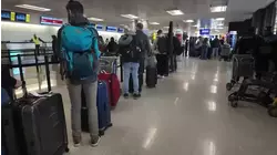 Travelers brace for holiday delays as government cuts flights at 40 airports