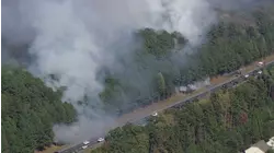 Lanes of I-540 closed due to multiple brush fires