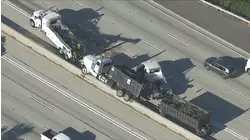 Crash involving semi shuts down several lanes of 405 freeway in Carson