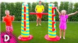 Diana and Roma Play Inflatable Limbo!