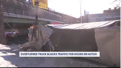 Person hospitalized after tractor-trailer overturns on Hutchinson River Parkway