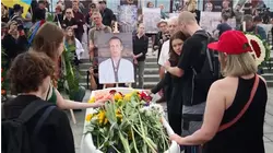 Ukrainians gather to honor an artist killed defending the country
