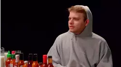 Mac DeMarco Tries to Stay Chill While Eating Spicy Wings