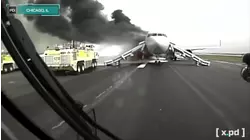 Firefighters Douse A Burning Aircraft