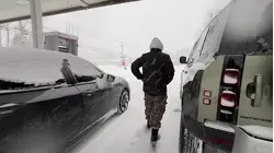 Officials warn conditions will worsen as snow blankets Orange County