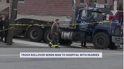 Dump truck rolls over on man in Port Chester, leaving him hospitalized with serious injuries