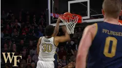 Wake Forest's Olivier Sarr Pins The Basketball...To The Rim