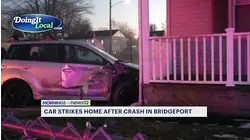 Car crashes into porch after two-car collision in Bridgeport