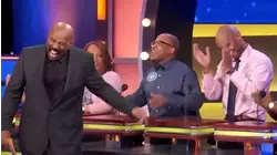 Mom goes TMI on TV. Steve Harvey comforts her son.