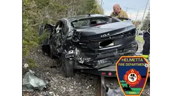 Driver escapes injury after train strikes car and leaves vehicle pinned in Helmetta